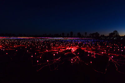 High angle view of illuminated people at night