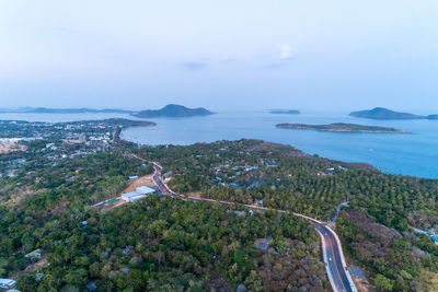 High angle view of road by sea against sky