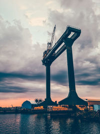 View of crane against sky during sunset