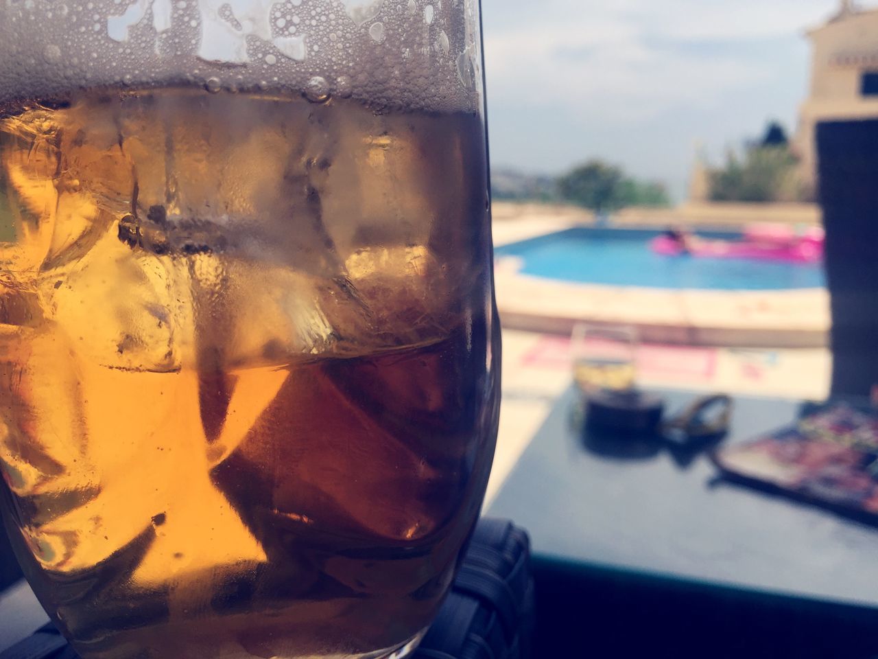 glass - material, close-up, focus on foreground, transparent, transportation, mode of transport, indoors, window, car, reflection, land vehicle, table, part of, day, still life, glass, no people, cropped, water, food and drink