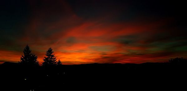 Scenic view of dramatic sky during sunset