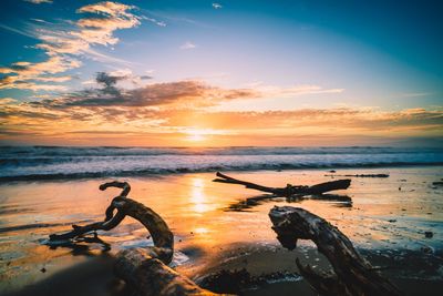 Scenic view of sea against sky during sunset