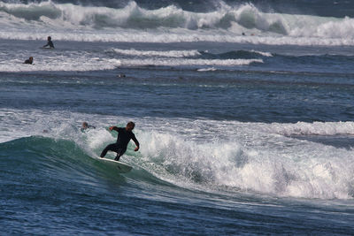 Man surfing in sea