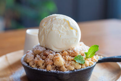 Close-up of ice cream in bowl on table