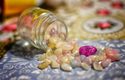 Close-up of multi colored candies on table