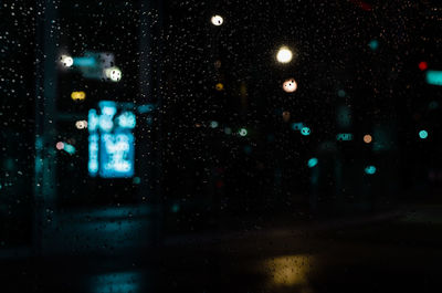 Wet street in rainy season at night