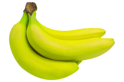 Close-up of bananas against white background