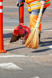 Man working on street in city