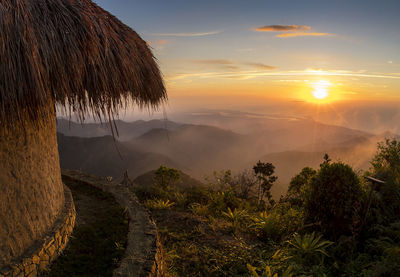 Scenic view of landscape against sky during sunset