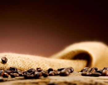 Close-up of coffee beans on table