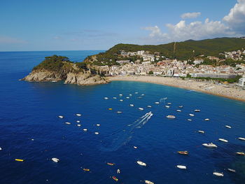 High angle view of sea against blue sky