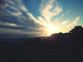 Scenic view of sea against sky at sunset