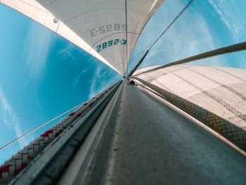 Low angle view of railroad tracks against sky