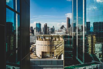 Modern cityscape against sky