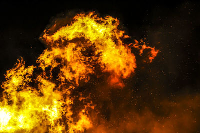 Close-up of fire against black background