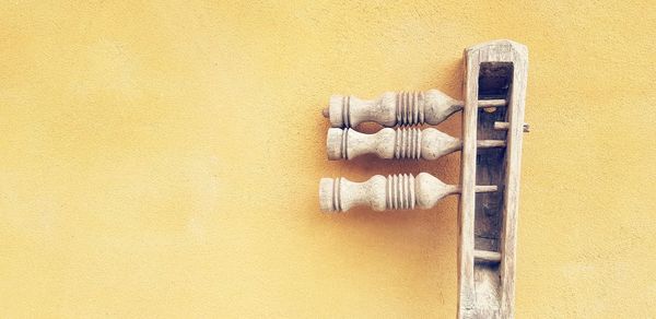 Close-up of clothes hanging on wall