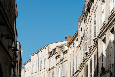 Decadent old residential buildings in the historic centre of la rochelle, france