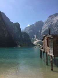 Scenic view of lake and mountains against sky