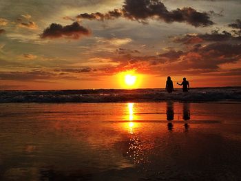 Scenic view of sea at sunset