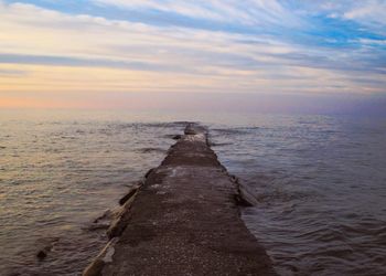 Scenic view of sea at sunset