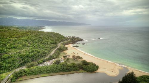 High angle view of bay against sky