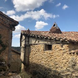 Low angle view of old building against sky