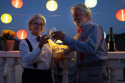 Smiling senior couple with wineglasses