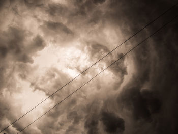 Low angle view of vapor trails in sky
