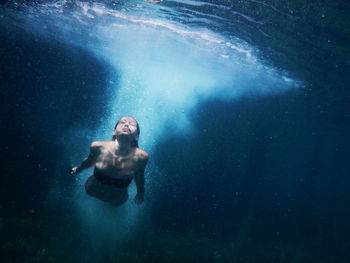 Man swimming in sea