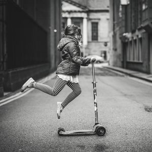 Full length of child on road