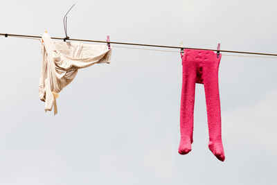 Close-up of clothes hanging on clothesline