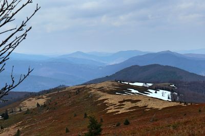 Scenic view of mountains against sky