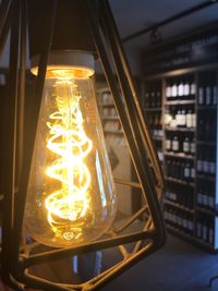 Close-up of illuminated light bulb