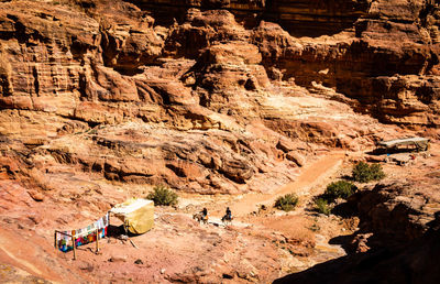 High angle view of people on rock