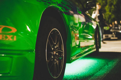 Close-up of vintage car on street