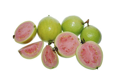 Close-up of fruits against white background