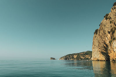 Scenic view of sea against clear sky