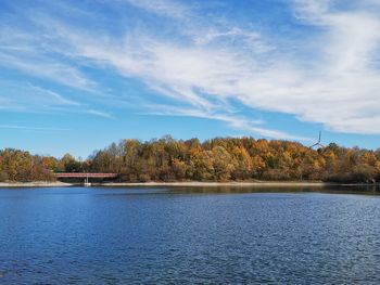 Scenic view of lake against sky during autumn