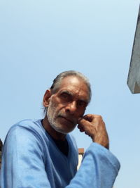 Low angle portrait of man