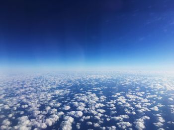 Aerial view of clouds against blue sky