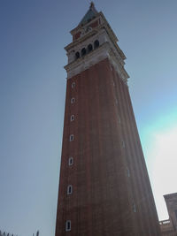 Low angle view of clock tower against sky