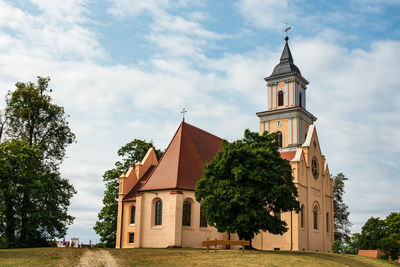 Church against sky in city