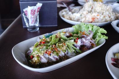 Close-up of salad in bowl on table