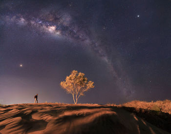 Scenic view of star field against sky at night