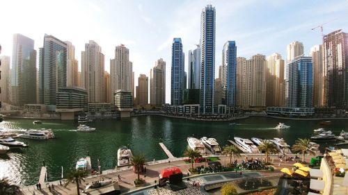 Panoramic view of city and buildings against sky