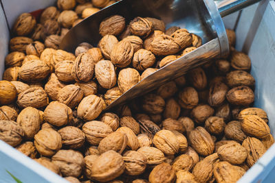 Close-up of walnuts for sale at market stall