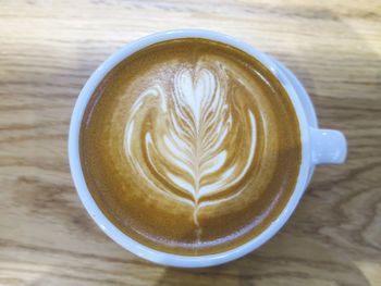 Close-up of cappuccino on table