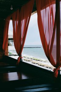 Scenic view of sea seen through window