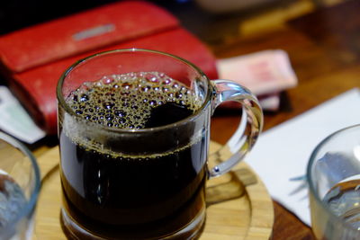 Close-up of beer in glass on table