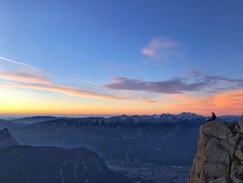 Scenic view of mountains against sky during sunset